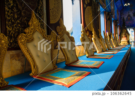 Buddhist monk seats at Blue Temple (Wat Rong Suea Ten) Beautiful temple in Chiang Rai province 106362645