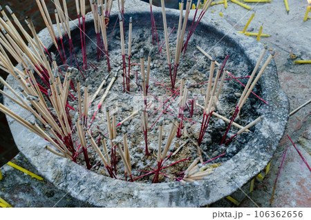 Incense at Ayutthaya ruins, at Wat Phra Si Sanphet temple. Incense at Ayutthaya ruins, at Wat Phra Si Sanphet temple. 106362656