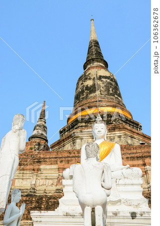 Beautiful view of the pagodas and buddhas of Ayutthaya ruins, at Wat Ratchaburana and Wat Phra Si Sanphet temple. Beautiful view of the pagodas and buddhas of Ayutthaya ruins, at Wat Ratchaburana and Wat Phra Si Sanphet temple. 106362678