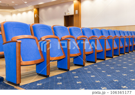 Conference hall with blue seats Conference hall with blue seats 106365177
