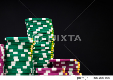 Stacks of playing chips on casino table Stacks of playing chips on casino table 106366400