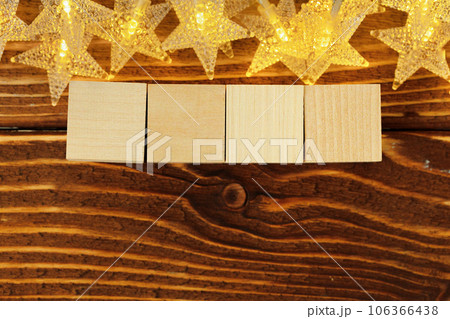 Four wooden blocks with deocrative stars. New Year concept 106366438