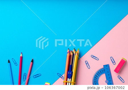 Back to school. Scattered stationery on paper background 106367002