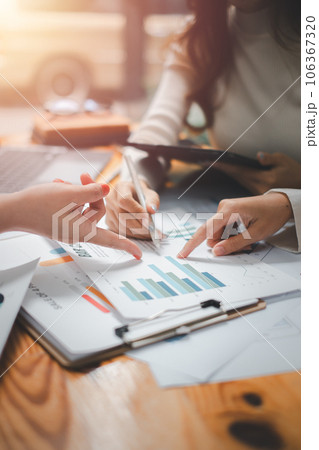 Group of business people analysis summary graph reports of business operating expenses and work data about the company's financial statements. Group of business people analysis summary graph reports of business operating expenses and work data about the company's financial statements. 106367320