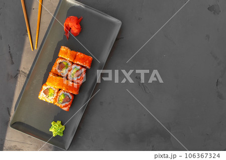 California sushi roll served on gray background 106367324