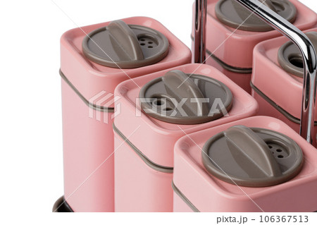 Set of plastic containers for spices isolated on white Set of plastic containers for spices isolated on white 106367513