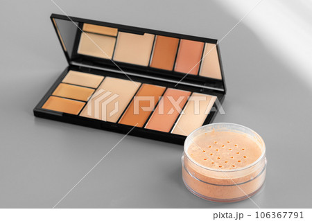 Make up set on gray background close up Make up set on gray background close up 106367791