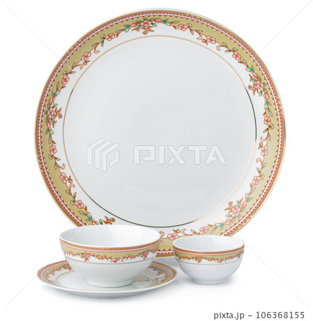 Set of new ceramic tableware with ornament isolated on white Set of new ceramic tableware with ornament isolated on white 106368155
