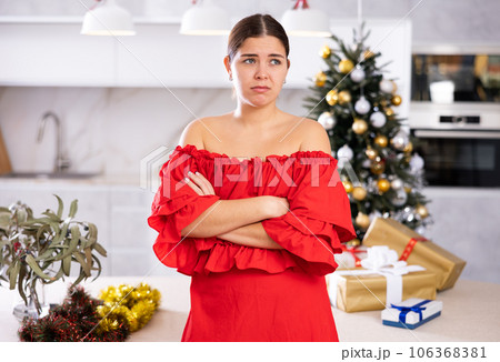 upset girl in a festive New Year s atmosphere 106368381