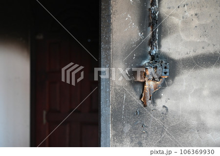 power plug electricty burn on brick wall texture background 106369930