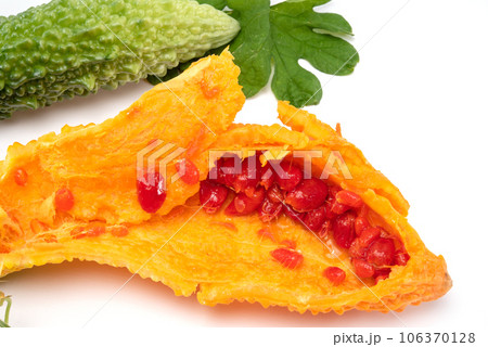 Bitter melon or bitter gourd (yellow) ready for seeds extraction. 106370128