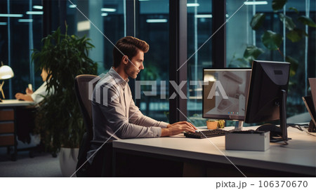 夜にオフィスで頑張って働く男性 man working hard in offie AI生成画像 106370670