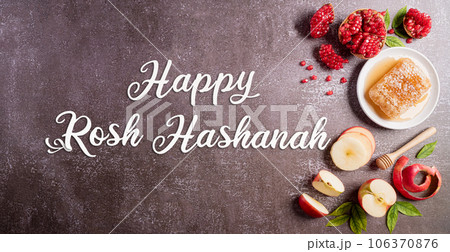 Rosh hashanah (Jewish New Year holiday), Concept of traditional or religion symbols on dark stone background. 106370876