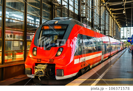 Red regional train at Zoologischer Garten Station in Berlin, Germany 106371578