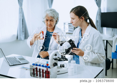 Scientist team meeting and writing analysis results in the laboratory study and analyze scientific sample with VR icon Scientist team meeting and writing analysis results in the laboratory study and analyze scientific sample with VR icon 106378600