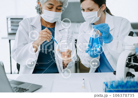 Scientist two woman with tablet and laptop, laboratory and ecofriendly science. Agriculture, research and scientists with online reading, test samples for global warming, analytics and tech.. Scientist two woman with tablet and laptop, laboratory and ecofriendly science. Agriculture, research and scientists with online reading, test samples for global warming, analytics and tech.. 106378735