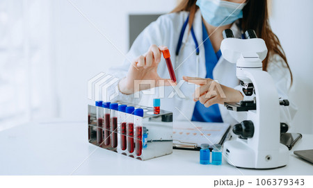 Dctor work on digital tablet healthcare doctor technology tablet using computer in laboratory study with virtual icon. 106379343