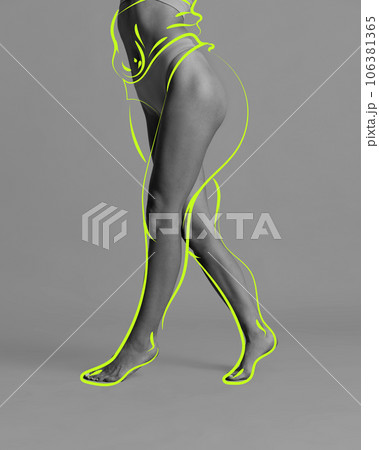 Cropped image of female slim legs with overlines neon lines symbolizing losing weight and slim shape. 106381365