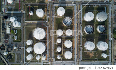 Aerial view liquid chemical tank terminal, Storage of liquid chemical and petrochemical products tank, Oil and gas storage tanks at industrial oil refinery. Aerial view liquid chemical tank terminal, Storage of liquid chemical and petrochemical products tank, Oil and gas storage tanks at industrial oil refinery. 106382934