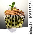 Cupcake with pistachios on the edge of a white table. Marshmallow, mint and pistachios. Close-up. 106387964