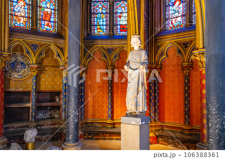 Lower chapel of Sainte-Chapelle with statue of Louis IX. Palais de la Cite, Paris, France 106388361