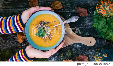 pumpkin soup on wooden table autumn dish pumpkin soup on wooden table autumn dish 106391092