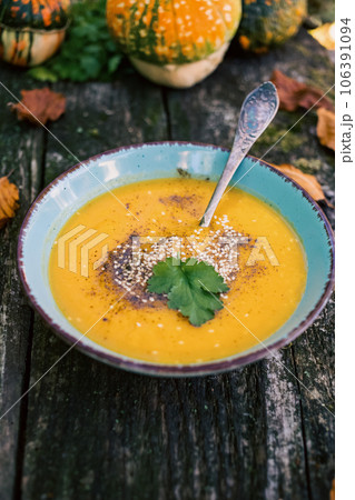 pumpkin soup on wooden table autumn dish pumpkin soup on wooden table autumn dish 106391094