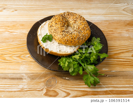 Bagel, Round Bread Bun, Wheat Bakery with Grains And Seeds for Breakfast, Plain Circle Bagel Bread Bagel, Round Bread Bun, Wheat Bakery with Grains And Seeds for Breakfast, Plain Circle Bagel Bread 106391514