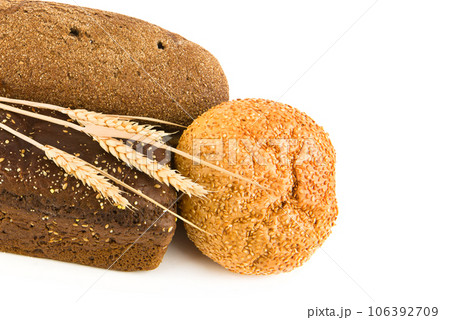 Bread, baguette and other pastries on a white . Free space for text. 106392709