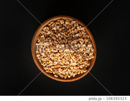 Wheat Grains, Barley Pile, Dry Cereal Seeds, Wheat Grains Heap on Black Wheat Grains, Barley Pile, Dry Cereal Seeds, Wheat Grains Heap on Black 106393323
