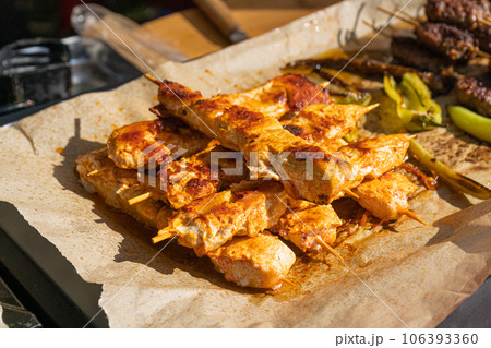 Small Skewers, Street Barbecue, Chicken Shish Kebab, Barbecue Shashlik, Skewered Grilled Chicken Meat Small Skewers, Street Barbecue, Chicken Shish Kebab, Barbecue Shashlik, Skewered Grilled Chicken Meat 106393360