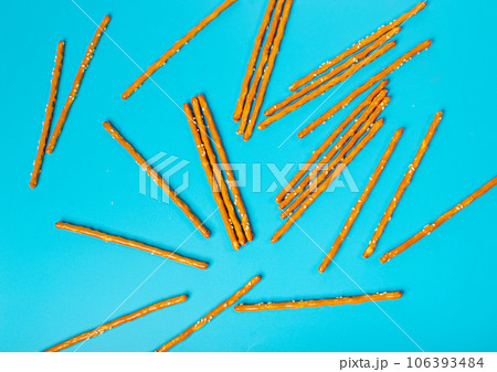 Bread Sticks, Pretzel Straws, Sesame Grissini, Pretzels Snack with Sesame Seeds, Long Rusks Bread Sticks, Pretzel Straws, Sesame Grissini, Pretzels Snack with Sesame Seeds, Long Rusks 106393484