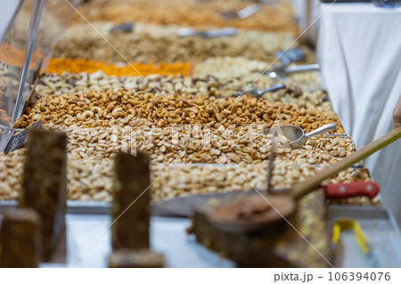 Corner with the sale of nuts at the market Corner with the sale of nuts at the market 106394076