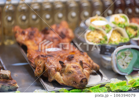 Roast pig with the head at the market Roast pig with the head at the market 106394079