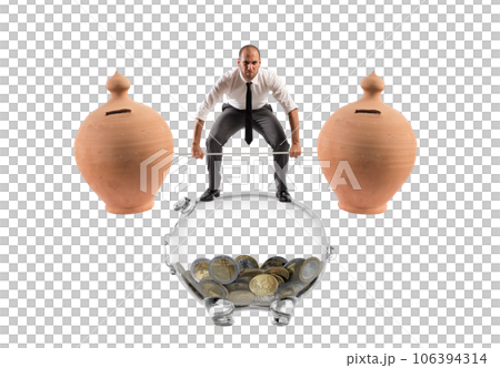 Powerful and determined  businessman trains with a barbell with piggy banks 106394314