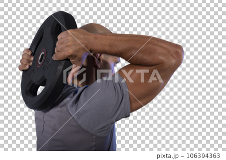 man works with balance disc at the gym man works with balance disc at the gym 106394363
