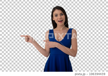 Isolated happy and joyful  woman indicates something 106394439