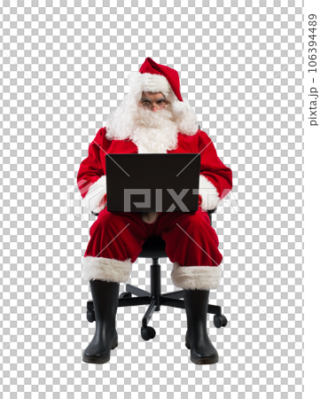 santa claus works with his laptop for christmas santa claus works with his laptop for christmas 106394489