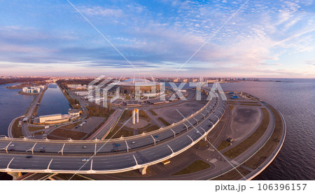 08 may 2019, St. PETERSBURG Russia: Aerial view of Football stadium Zenit Arena at sunset and new road - Western High Speed Diameter connecting Krestovsky and Vasilyevsky Islands. Viaduct above Neva 106396157