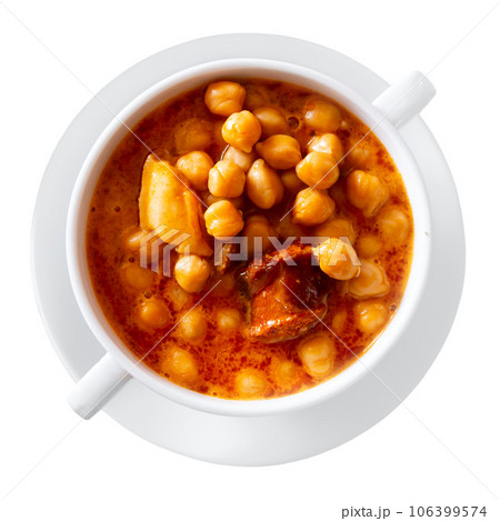 Garbanzos a la riojana, chickpea simmered with chorizo, pancetta, vegetables 106399574