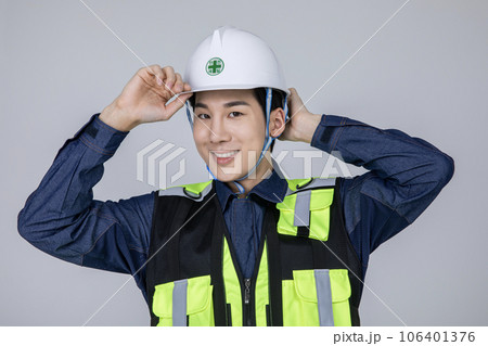 millennials and gen z, korean asian young man, site staff wearing a safety helmet 106401376
