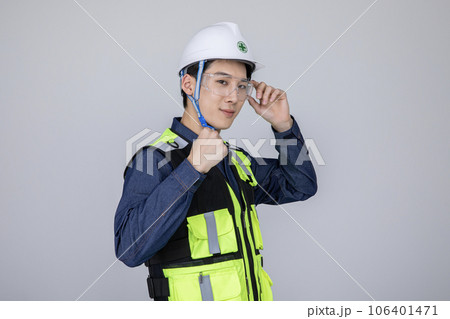 millennials and gen z, korean asian young man, site staff wearing protective goggles with hand motion millennials and gen z, korean asian young man, site staff wearing protective goggles with hand motion 106401471