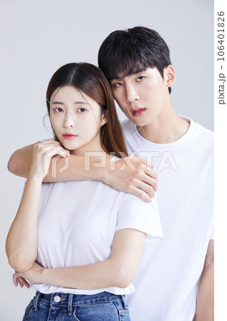 korean asian young couple embracing shoulders, wrapping shoulders around each other's shoulders korean asian young couple embracing shoulders, wrapping shoulders around each other's shoulders 106401826