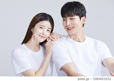 korean asian young couple sitting with hands on shoulders korean asian young couple sitting with hands on shoulders 106401832