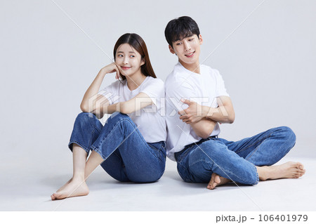 korean asian young couple standing back to back korean asian young couple standing back to back 106401979