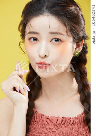 beauty concept photo of korean asain beautiful woman with hand motions 106402341
