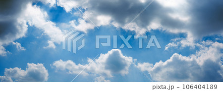 Puffy clouds. Clouds and dark blue skys background textures 106404189