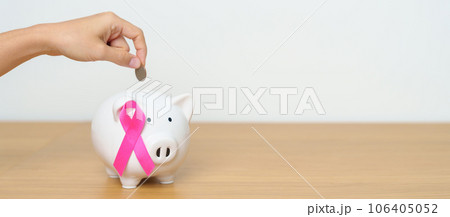 October Breast Cancer Awareness month, Pink Ribbon with Piggy Bank for support illness life. Health, Donation, Charity, Campaign, Money Saving, Fund, women day and World cancer day concept October Breast Cancer Awareness month, Pink Ribbon with Piggy Bank for support illness life. Health, Donation, Charity, Campaign, Money Saving, Fund, women day and World cancer day concept 106405052