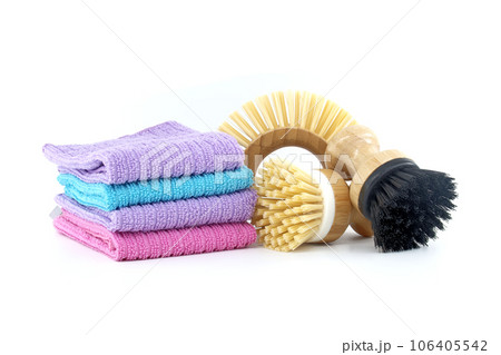 Group of multiple dish brushes and dishcloths over white Group of multiple dish brushes and dishcloths over white 106405542