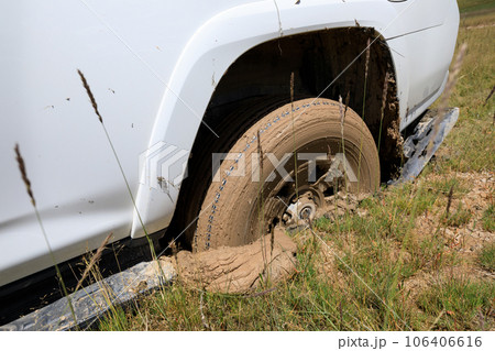 Offroad car got stuck in the mud 106406616